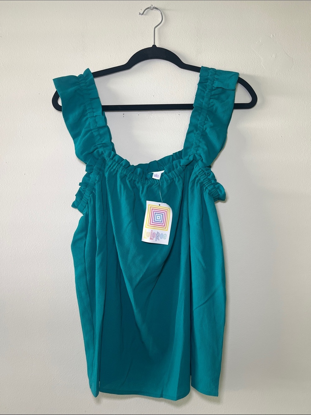 LuLaRoe Daisy Turquoise Rufﬄe Strap Tank Top